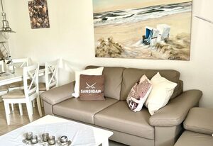 Friesenglück – 3-Zimmer-Ferienwohnung für bis zu 4 Personen mit Sonnenkuhle.