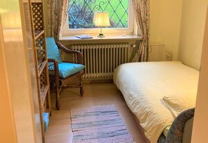Ferienwohnung Iris I Ruhig & Wohlfühlen im Garten