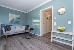 Nis Puk – Ferienwohnung in Westerland für max. 3 Personen, mit Westterrasse und Parkplatz.