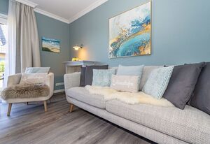 Nis Puk – Ferienwohnung in Westerland für max. 3 Personen, mit Westterrasse und Parkplatz.