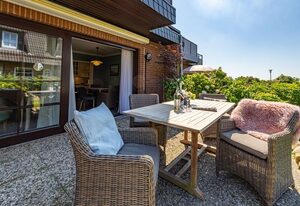 Nis Puk – Ferienwohnung in Westerland für max. 3 Personen, mit Westterrasse und Parkplatz.