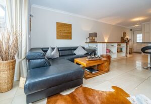 Godewind App. 5 – Ferienwohnung für bis zu 4 Personen mit Terrasse und Sauna.