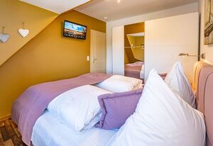 App.Reetlodge – Ferienwohnung unter Reet für bis zu 4 Personen mit Sonnenkuhle.
