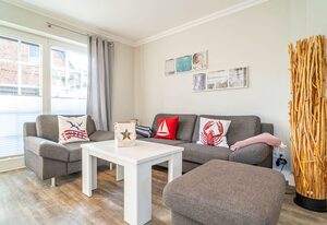 Haus Strandoase – Ferienhaushälfte für bis zu 6 Personen. Mit Sauna, Süd Terrasse und Süd Balkon.