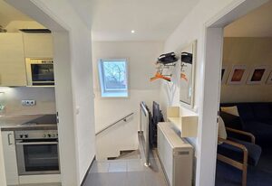 Ferienhaus Am Dorfteich 16a OG in Wenningstedt – Ferienhaus am Dorfteich 16a OG – Ferienwohnung in Wenningstedt auf Sylt mit Dünenblick, Garten & Strandnähe für bis zu 5 Personen