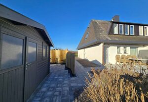 Ferienhaus Am Dorfteich 16a OG in Wenningstedt – Ferienhaus am Dorfteich 16a OG – Ferienwohnung in Wenningstedt auf Sylt mit Dünenblick, Garten & Strandnähe für bis zu 5 Personen