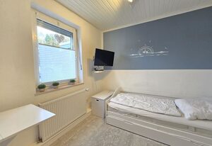 Ferienhaus Lüttje Uttiet mit eingezäunten Garten