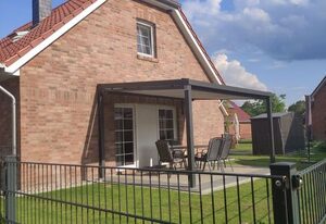 Strandhaus Meeresluft – Hochwertiges 100qm Ferienhaus für 6 Pers. mit Kamin und Garten direkt am Deich
