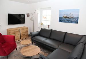 Stüürmanns Huus – Luxus 100qm Ferienhaus für 6 Pers mit Sauna, Kamin & Garten beim Naturbadestrand