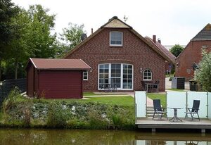 Riedhaus am Siel – 100qm Ferienhaus für 6 Pers. + Hund mit Kamin, Wärmekabine & Garten in Top-Lage