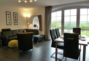 Riedhaus am Siel – 100qm Ferienhaus für 6 Pers. + Hund mit Kamin, Wärmekabine & Garten in Top-Lage