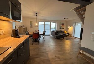 Meer & Mehr – 85qm Ferienhaus für 4 Personen mit Infrarotkabine, Terrasse und Garten am Deich