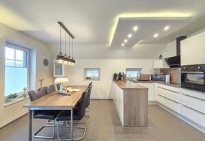 Ferienhaus Urlaubsglück Neßmersiel – Modernes Ferienhaus mit Kamin, Garten und familienfreundlicher Ausstattung