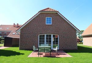 Hampton Huus – Hundefreundliches Ferienhaus (100qm) mit Sauna, Kamin und Garten für 6 Personen