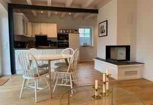 Hampton Huus – Hundefreundliches Ferienhaus (100qm) mit Sauna, Kamin und Garten für 6 Personen