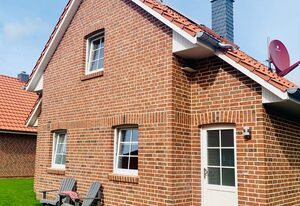 Hampton Huus – Hundefreundliches Ferienhaus (100qm) mit Sauna, Kamin und Garten für 6 Personen