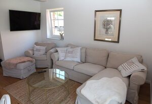 Hampton Huus – Hundefreundliches Ferienhaus (100qm) mit Sauna, Kamin und Garten für 6 Personen