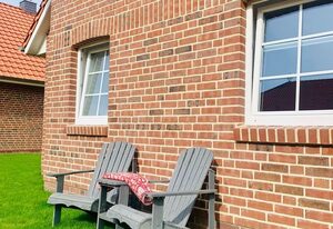 Hampton Huus – Hundefreundliches Ferienhaus (100qm) mit Sauna, Kamin und Garten für 6 Personen