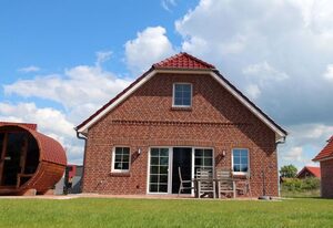 Framheim – Luxus-Ferienhaus am Wasser nahe Greetsiel mit Sauna