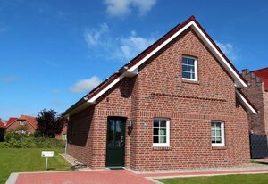Framheim – Luxus-Ferienhaus am Wasser nahe Greetsiel mit Sauna