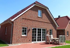 Framheim – Luxus-Ferienhaus am Wasser nahe Greetsiel mit Sauna