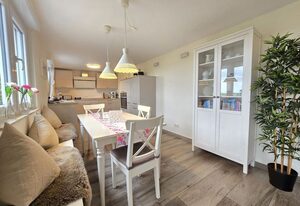 Ferienhaus Zuhause am Deich Neßmersiel – Freistehendes Ferienhaus mit Garten, Kaminofen und Terrasse in Neßmersiel