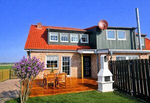 Ferienhaus : Huus an`t Diek, Maisonette Wohnung in Deichnähe, Nähe Norddeich