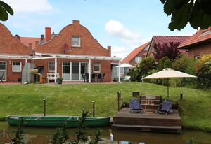 Grachtenkate – Traumhaftes Ferienhaus direkt am Wasser