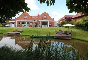 Grachtenkate – Traumhaftes Ferienhaus direkt am Wasser