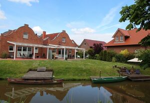 Grachtenkate – Traumhaftes Ferienhaus direkt am Wasser