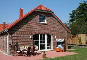 Stella Maris – Hochwertiges 100qm Ferienhaus für 6 Personen mit Sauna, Kamin und großem Garten