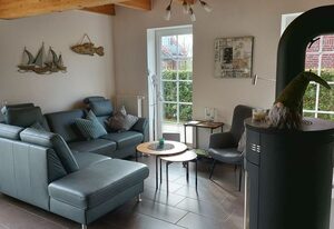 Stella Maris – Hochwertiges 100qm Ferienhaus für 6 Personen mit Sauna, Kamin und großem Garten