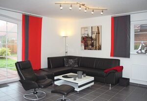 Nordlicht – Ferienhaus (100qm) für 6 Personen mit Kamin und Garten in zentraler Lage