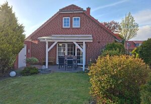 Freia en Uli – Freistehendes Ferienhaus in Norden mit Garten, Kaminofen & Terrasse