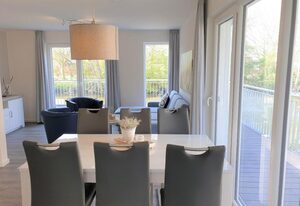 Haus Nr. 33,  Ferienhaus Deichgraf – Modernes Ferienhaus, Kamin, Sauna, Süd-Terrasse, Loggia mit Meerblick, Haustiere