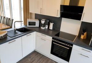 Haus Nr. 07, Ferienhaus Deichgraf – Modernes Ferienhaus, Sauna, Süd-Terrasse, Loggia mit Meerblick, Haustiere