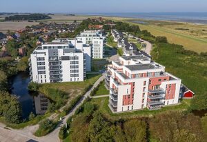 NordseeResort Friesland – Tolles Penthouse mit 54 qm großer Dachterrasse, Meerblick, Sauna und Hot-Tub!