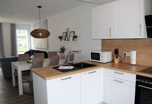 Haus Nr. 21, Ferienhaus Fischerhus – Modernes Ferienhaus, Kamin, Sauna, Süd-Terrasse, Loggia mit Meerblick, Haustiere