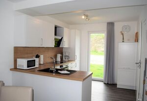 Haus Nr. 21, Ferienhaus Fischerhus – Modernes Ferienhaus, Kamin, Sauna, Süd-Terrasse, Loggia mit Meerblick, Haustiere