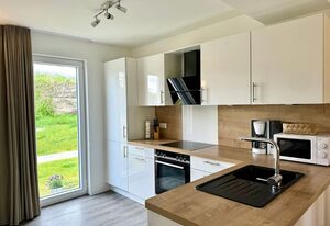 Haus Nr. 18, Ferienhaus Fischerhus – Gepflegtes Ferienhaus, Kamin, Sauna, Süd-Terrasse, Loggia mit Meerblick,
