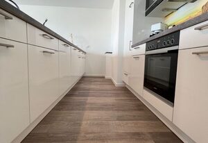 49.6.N Dwarslöper – Moderne Ferienwohnung, Kamin, Sauna, großer Balkon, Meerblick, strandnah