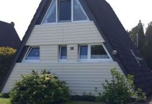 Nurdachhaus FUEST – Modernes Nurdach-Ferienhaus im Nordsee-Ferienpark Fedderwardersiel.