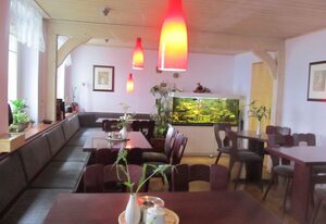 Pension Mahret´s Puppenstube – Familienzimmer mit Doppelbett, Wohnzimmer und Du/WC