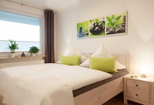 Ferienwohnung Nordlicht inklusive Strandkorb an der Förde – Ferienwohnung Nordlicht mit Meerblick