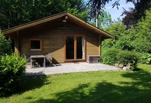 Gemütliches Blockhaus auf historischem Dreiseithof – Ferienhaus Ströh