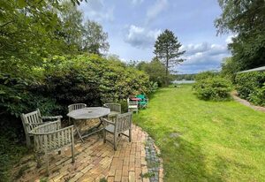 Haus am See – Ferienhaus, Dusche und Badewanne, Seeblick