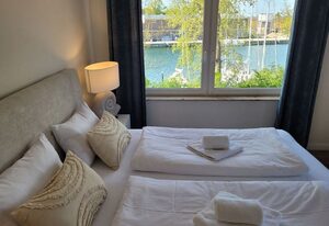 Große Ferienwohnung mit traumhaftem Hafenblick von "Momentic" – Luxus-Appartment direkt am Hafen von Neustadt in Holstein