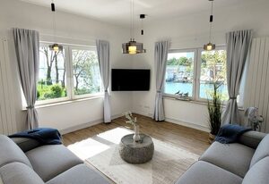 Große Ferienwohnung mit traumhaftem Hafenblick von "Momentic" – Luxus-Appartment direkt am Hafen von Neustadt in Holstein