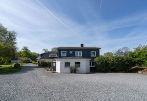 Villa Lotsenhaus – Exklusives Ferienhaus mit Dachterrasse, Meerblick, Sauna & stilvoller Einrichtung