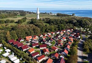 Feriendorf Südstrand – Schönes Ferienhaus für 2 Erwachsene und 4 Kinder mit Kamin & Garten in Strandnähe